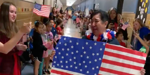 Students and teachers at an elementary school in Texas surprised a cafeteria worker who became a U.S. citizen earlier this month with a celebratory parade. 