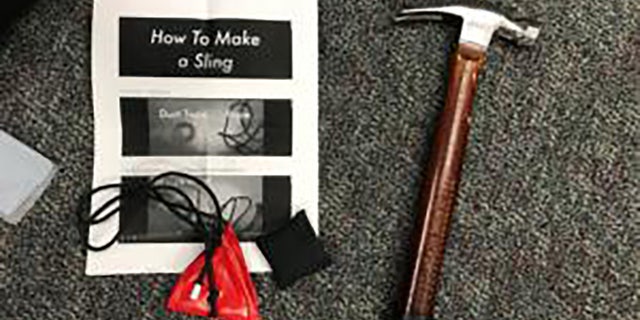 Objects seized from demonstrators included a hammer and instructions on how to make a sling shot. (Portland Police Bureau)