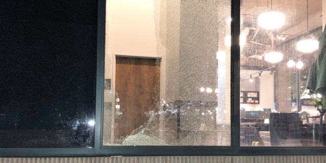 Rioters smashed a Starbucks window in downtown Portland during a night of vandalism earlier this month.