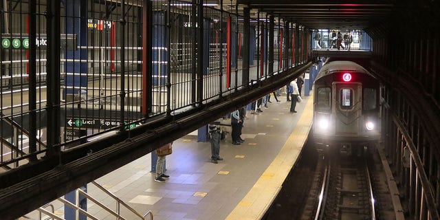A 4 train arrives at the Union Square subway station April 4, 2021, in New York City. 