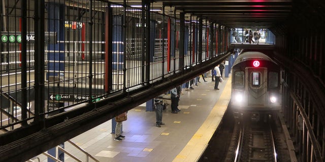 A 4 train arrives at the Union Square subway station April 4, 2021, in New York City.