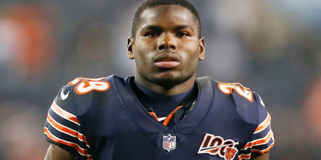 Tarik Cohen #29 of the Chicago Bears jogs across the field following his team's loss to the New Orleans Saints at Soldier Field on October 20, 2019 in Chicago, Illinois.