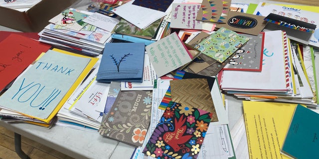 Handwritten "thank you" cards were given to NYPD officers on Monday in the 83rd precinct of Brooklyn North.