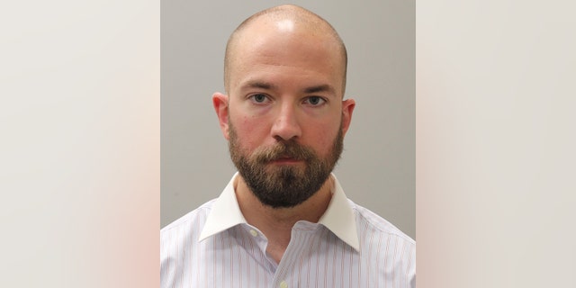 This booking photograph from Friday shows Huntsville, Ala., police officer William Darby, who was convicted of murder in a fatal shooting that happened in 2018. Prosecutors argued that Darby had no justifiable reason to shoot Jeffrey Parker as Parker held a gun to his own head. (Madison County Sheriff's Office via AP)