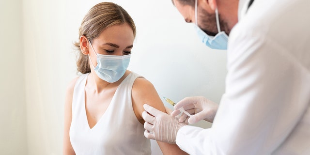 A woman in a clinic about to receive a vaccine. "Main limitations of [new] The study said the survey did not include questions to dig deeper into what drives the growing burden of health care costs." Dr. Jose A. Pagan told Fox News Digital.