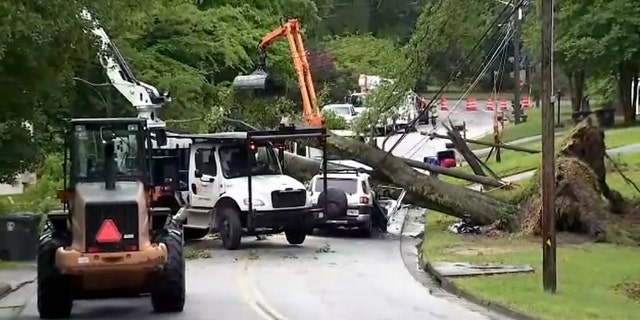 Storm damage in a neighborhood in Douglasville during tornado warnings in metro Atlanta. One fatality was reported when a tree fell on a car.