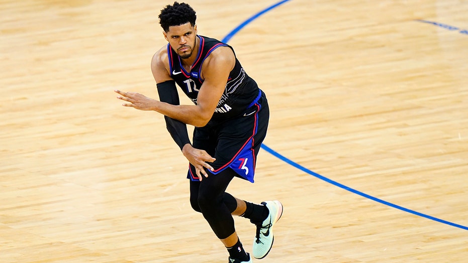 Harris scores 37 leads 76ers past Wizards 125-118 in Game 1