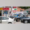 Customers wait in line to purchase fuel at the Duck-Thru in Scotland Neck, North Carolina, on Tuesday, May 11, 2021. The station was doing a brisk business on Tuesday as news of the cyberattack on the Colonial Pipeline spread fear of a gas shortage in rural North Carolina.