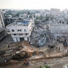 Rescue efforts continue to evacuate Palestinians from the rubble of the buildings destroyed by ongoing Israeli airsrtikes on Gaza in Beit Lahia, Gaza, on May 13, 2021. Palestinians in Gaza Strip observe Eid al-Fitr, which marks the end of the holy month of Ramadan, under Israeli airstrikes on Gaza. (Mustafa Hassona/Anadolu Agency via Getty Images)