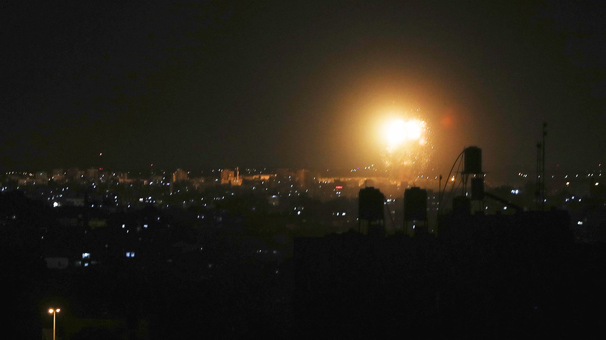 Smoke and flames are seen after an Israeli air strike in the northern Gaza Strip, June 17, 2021. REUTERS/Mohammed Salem