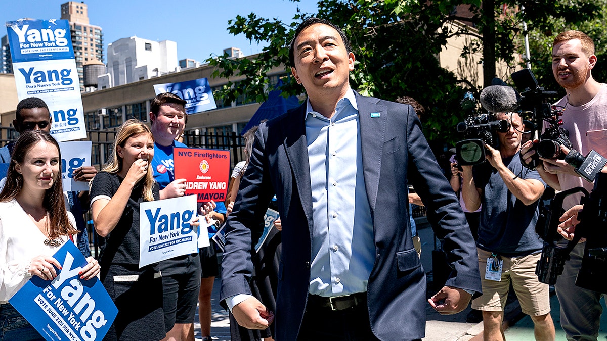 New York City mayoral candidate Andrew Yang arrives to an early voting site before casting his vote, Wednesday, June 16, 2021, in New York. Candidates in New York City's heavily contested Democratic mayoral primary urged people to go to the polls in the coming days as early voting kicked off Wednesday. (AP Photo/John Minchillo)
