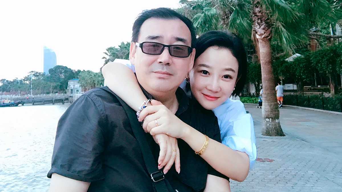 This undated, file photo released by Chongyi Feng shows Yang Hengjun and his wife Yuan Xiaoliang. (Chongyi Feng via AP, File)