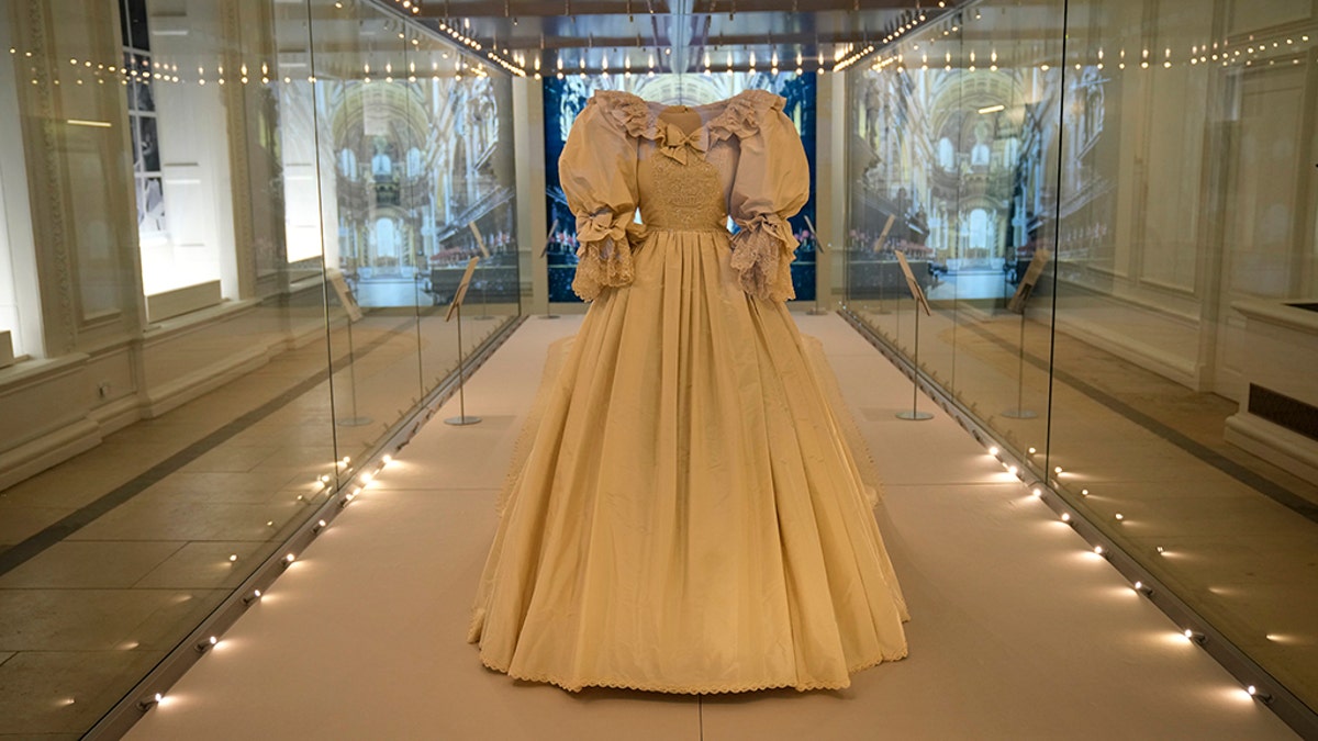 The wedding dress of Britain's Princess Diana is displayed at the "Royal Style in the Making" exhibition at Kensington Palace. (AP Photo/Matt Dunham)