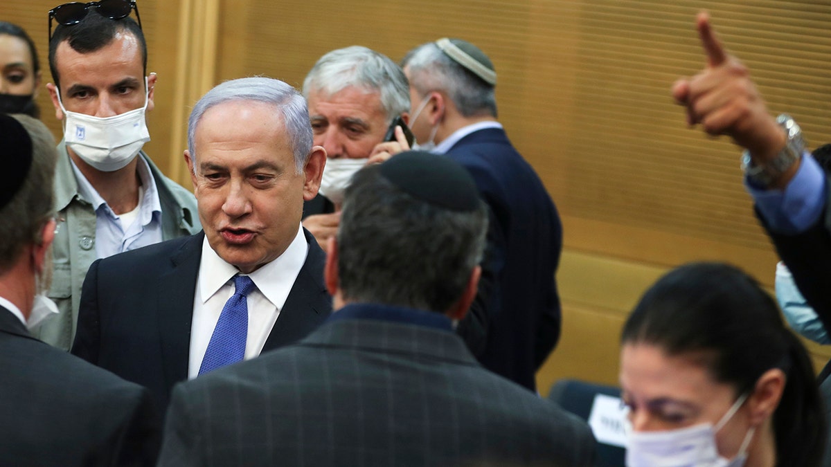 Israeli Prime Minister Benjamin Netanyahu looks on after a special session of the Knesset whereby Israeli lawmakers elected Isaac Herzog as the nation's new president, in Jerusalem Wednesday, June 2, 2021. (Associated Press)