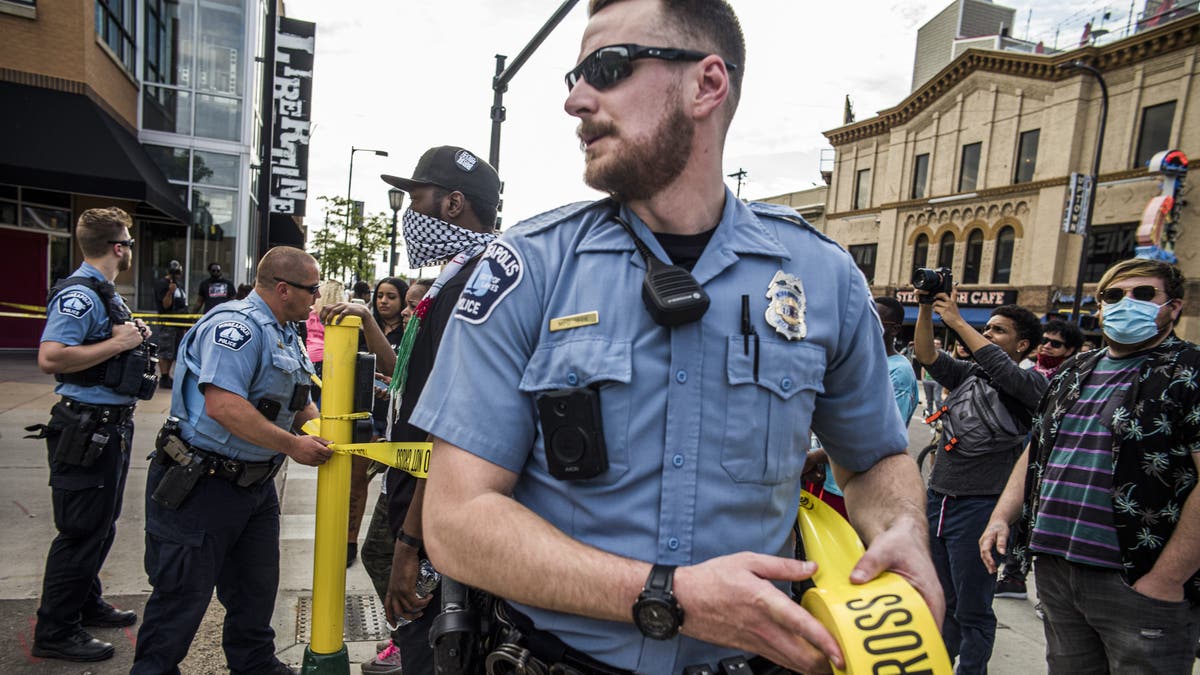 Police investigate a shooting as protesters gather on Thursday, June 3, 2021, in Minneapolis. (Richard.Tsong-Taatari/Star Tribune via AP)