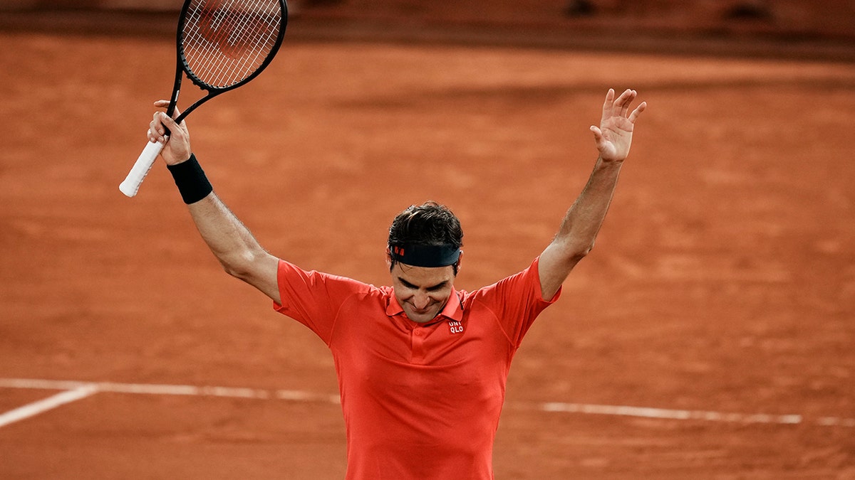 Switzerland's Roger Federer celebrates after defeating Germany's Dominik Koepfer in their third round match on day 7, of the French Open tennis tournament at Roland Garros in Paris, France, Saturday, June 5, 2021. (AP Photo/Thibault Camus)