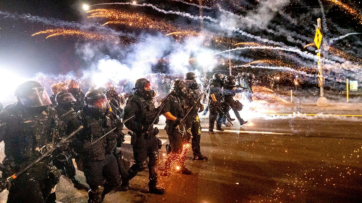 Portland police use gas to disperse protesters