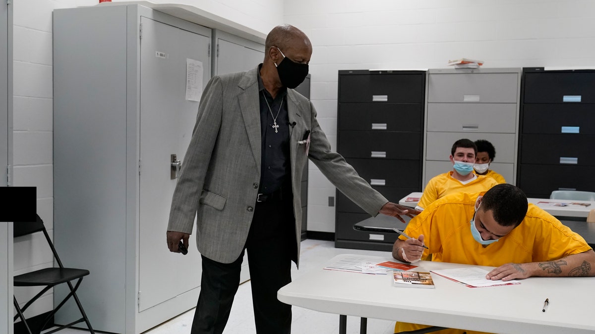 May 20, 2021: The Rev. Burton Barr works with inmates at the St. Louis City Justice Center.