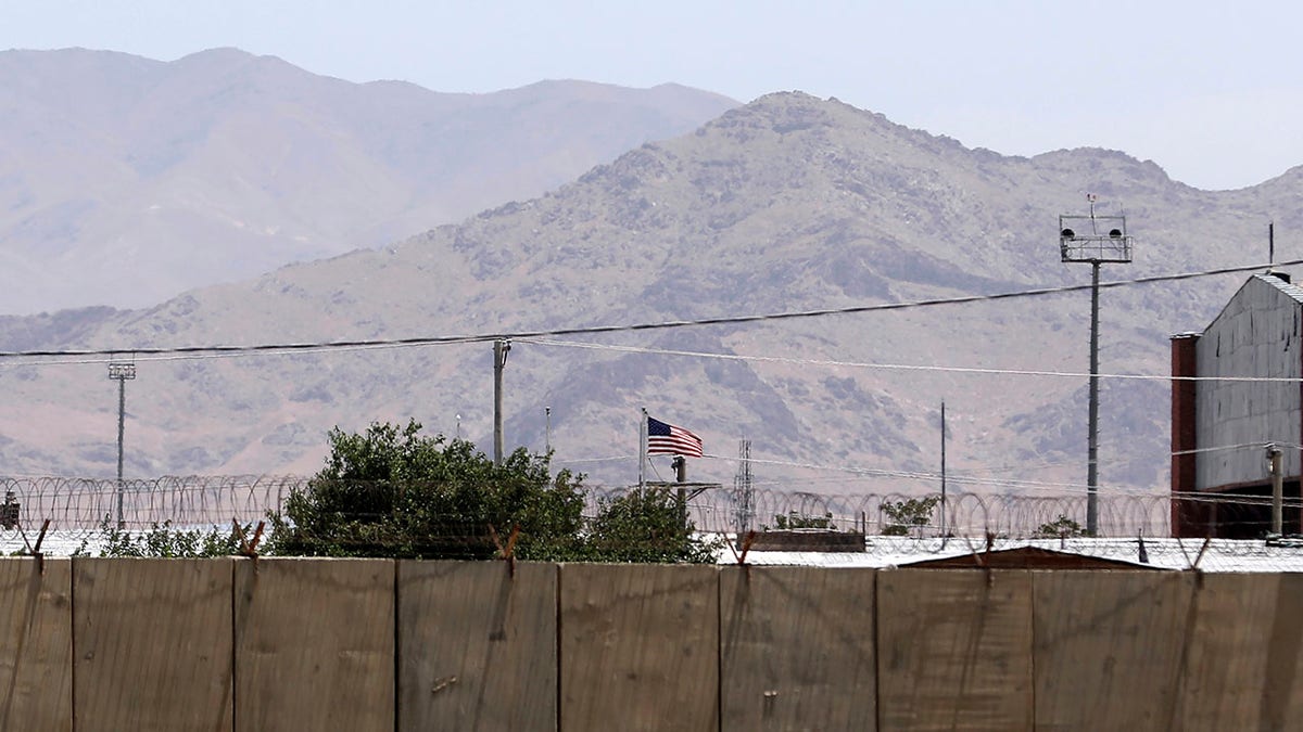 FILE – The flag of the United States flies over Bagram Air Base, in Afghanistan, Friday, June 25, 2021.