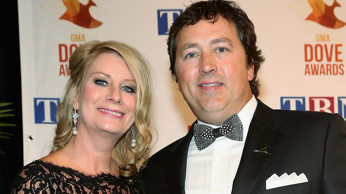 Lisa Robertson and Al Robertson of Duck Dynasty backstage at the 45th Annual GMA Dove Awards at Allen Arena, Lipscomb University on October 7, 2014, in Nashville, Tenn.  (Photo by Terry Wyatt/Getty Images for Dove Awards)