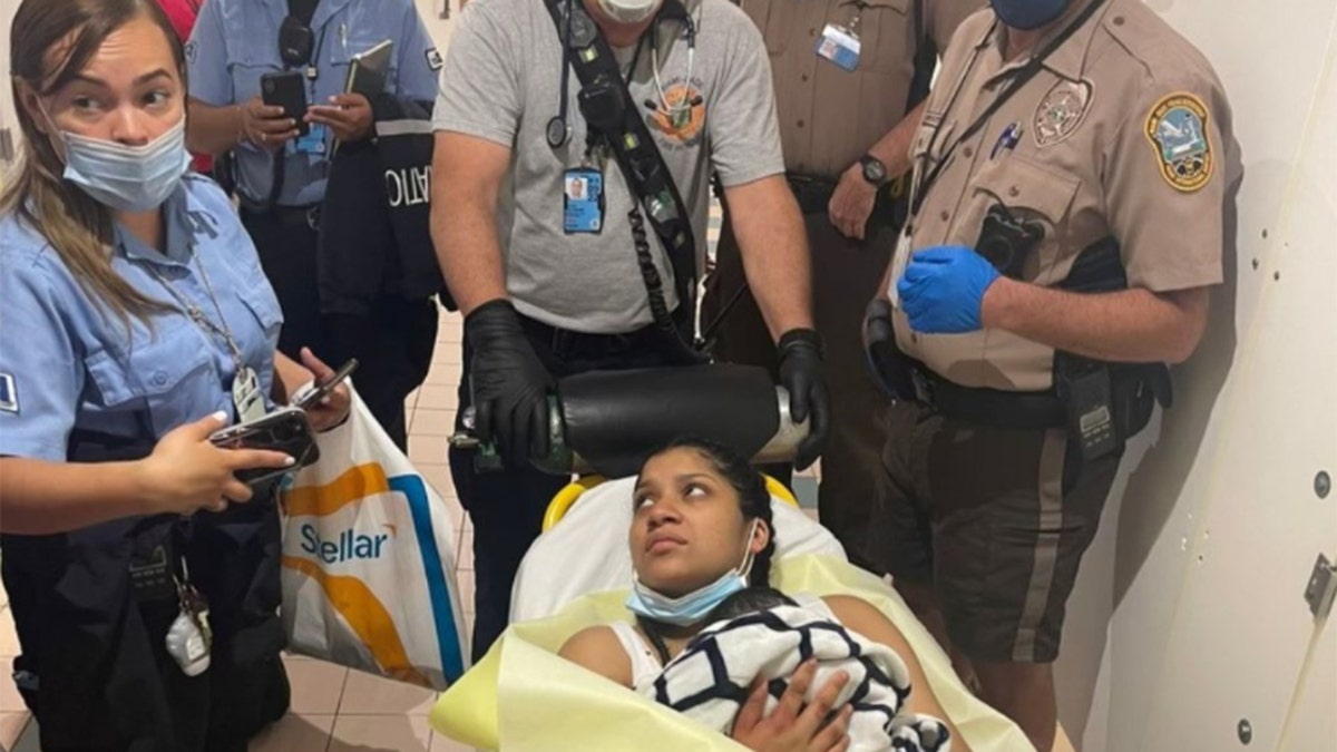 A woman gave birth to a baby girl at the Miami International Airport, after having just arrived on a flight from Chicago.