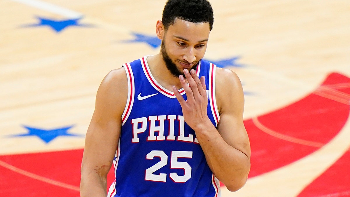 Philadelphia 76ers Ben Simmons wipes his face after missing a pair of free-throws during the first half of Game 5 in a second-round NBA basketball playoff series against the Atlanta Hawks, Wednesday, June 16, 2021, in Philadelphia.
