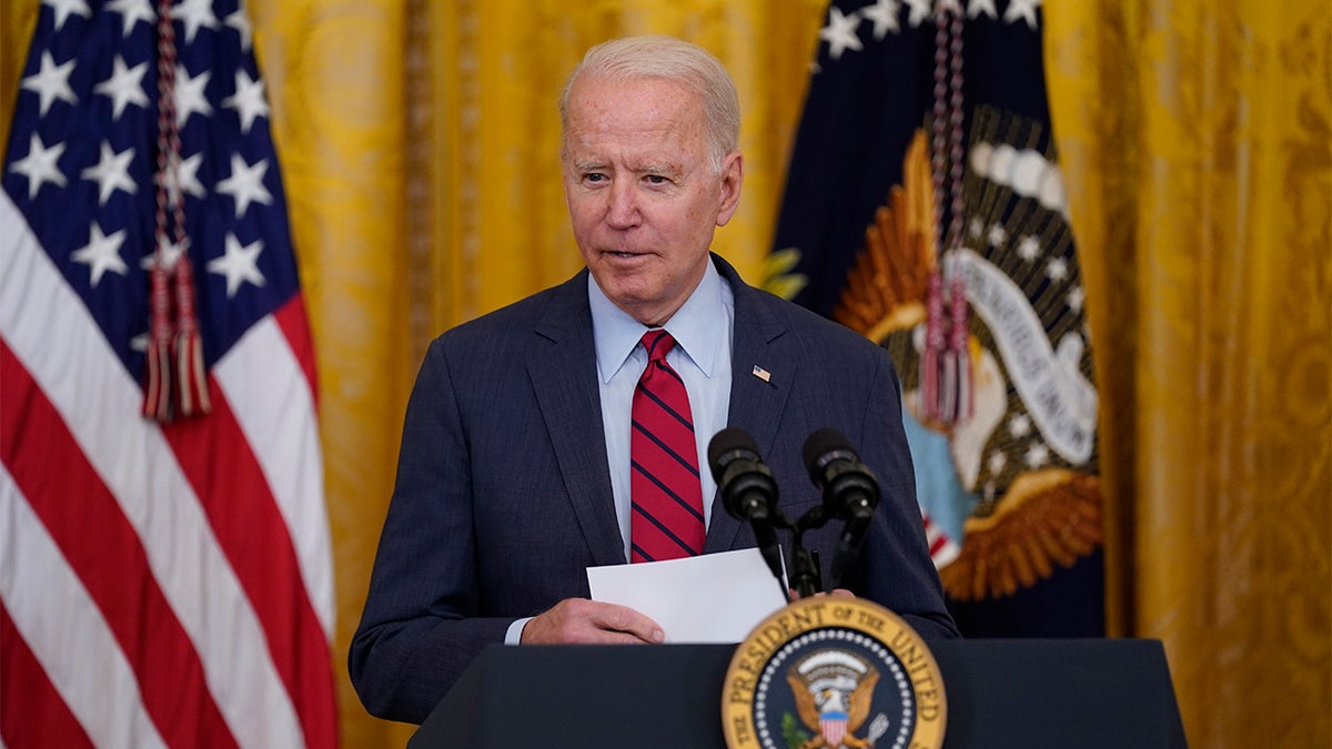 President Joe Biden arrives to speak about infrastructure negotiations, in the East Room of the White House, Thursday, June 24, 2021, in Washington. (AP Photo/Evan Vucci)