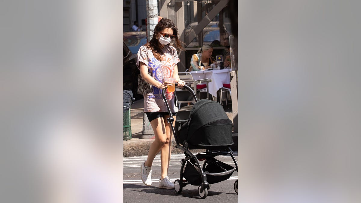 Emily Ratajkowski out for a walk with son Sylvester Apollo Bear on May 19, 2021, in New York City.