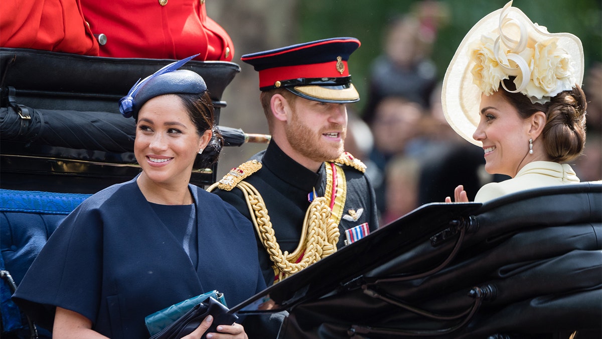 Kate Middleton (right) allegedly wanted to smooth things over with the Duke and Duchess of Sussex.