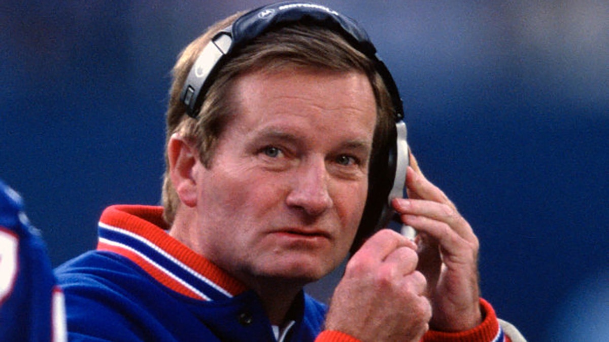 Head Coach Jim Fassel of the New York Giants looks on from the sidelines against the Minnesota Vikings during the NFC Championship Game on January 14, 2001, at Giants Stadium in East Rutherford, New Jersey. The Giants won the game 41-0. (Photo by Focus on Sport/Getty Images)