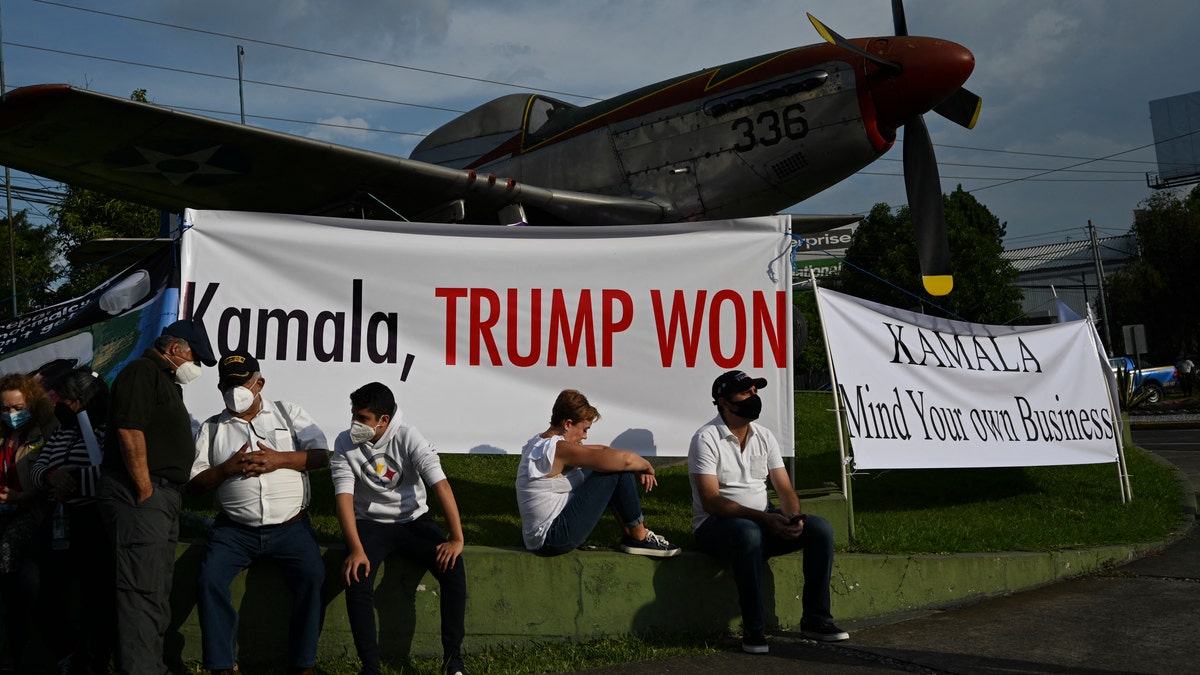 People take part in a demonstration against the visit of Vice President Kamala Harris outside the Air Force Base in Guatemala City, on June 6, 2021. (JOHAN ORDONEZ/AFP via Getty Images)