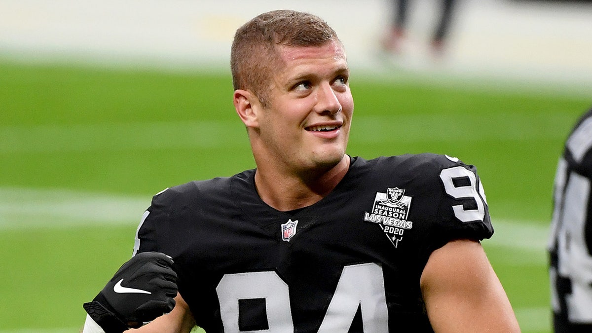 LAS VEGAS, NEVADA - NOVEMBER 15:  Carl Nassib #94 of the Las Vegas Raiders flexes during warmups before a game against the Denver Broncos at Allegiant Stadium on November 15, 2020 in Las Vegas, Nevada. The Raiders defeated the Broncos 37-12.  (Photo by Ethan Miller/Getty Images)