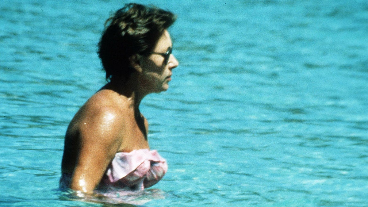 Princess Margaret swimming in the blue sea.
