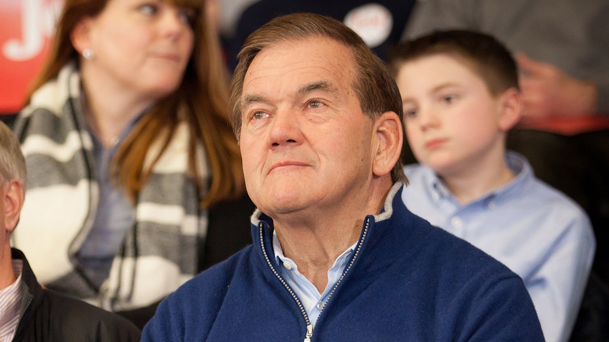 Former Homeland Security secretary Tom Ridge listen as Republican presidential candidate Jeb Bush speaks at a town hall-style meeting on February 6, 2016 at the McKelvie Intermediate School in Bedford, New Hampshire. 