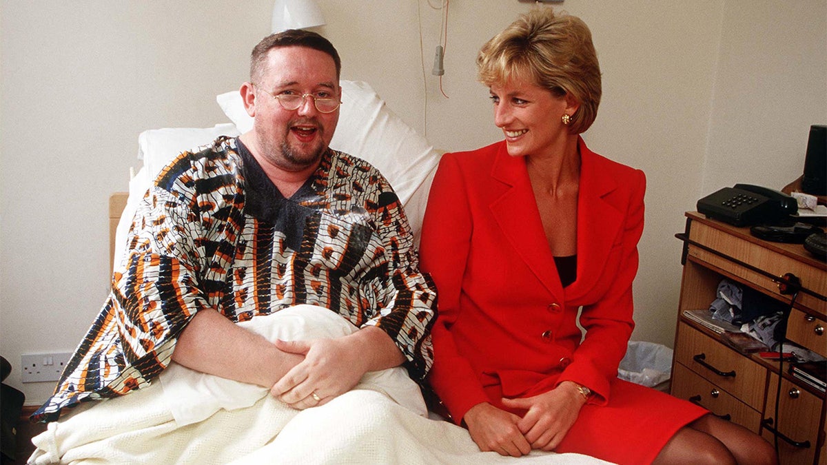 Princess Diana visiting a patient at the London Lighthouse
