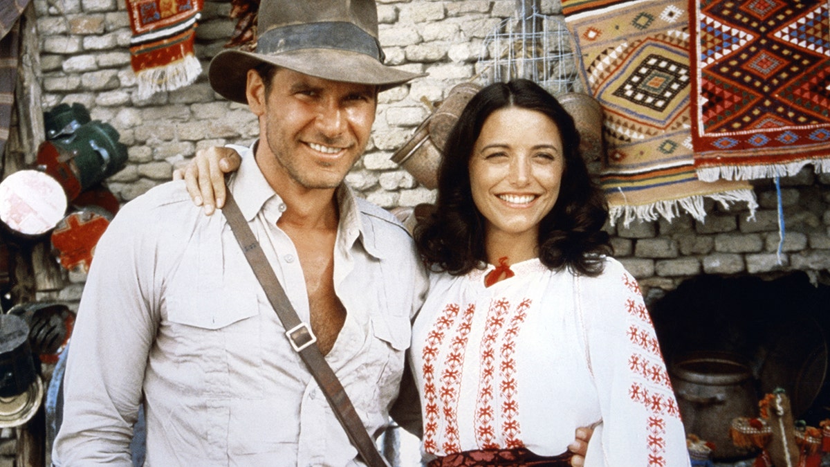 Harrison Ford and actress Karen Allen on the set of 'Raiders of the Lost Ark.'