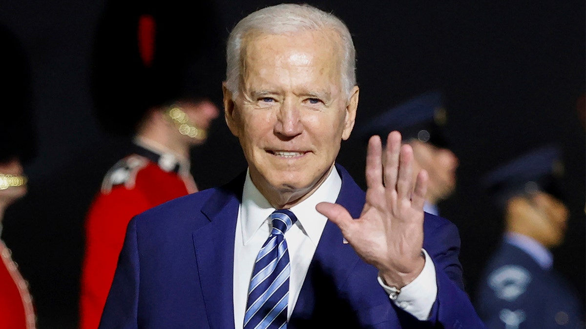 President Joe Biden waves on his arrival on Air Force One at Cornwall Airport Newquay, in Newquay, England,  ahead of the G-7 summit, Wednesday, June 9, 2021. (Phil Noble/Pool Photo via AP)