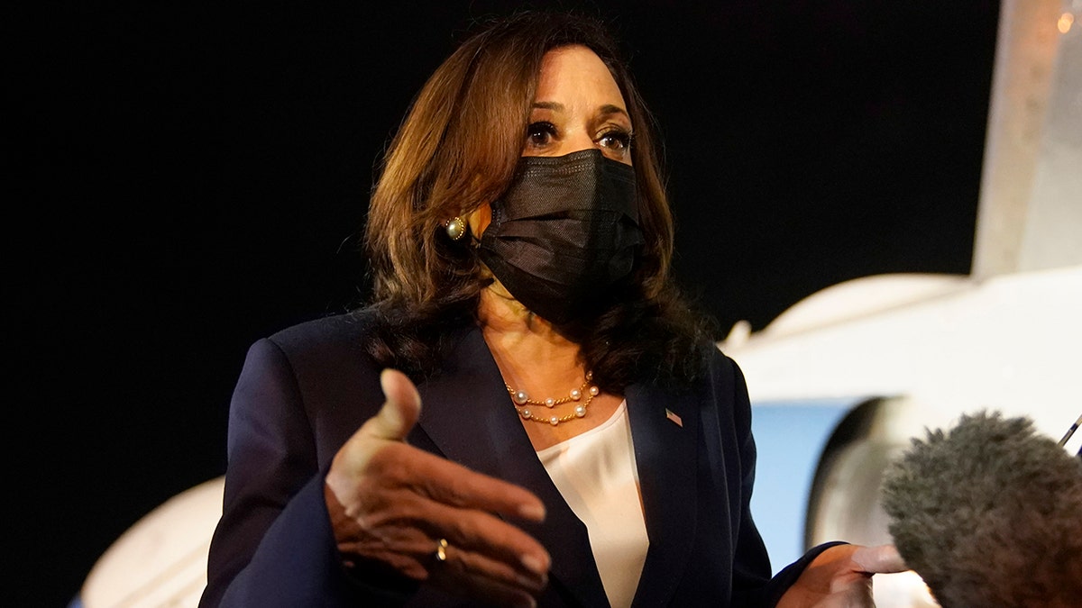 June 7, 2021: Vice President Kamala Harris talks to the press gathered under the wing of Air Force Two as she prepares to depart for Mexico, from Guatemala's Air Force Central Command. (AP Photo/Jacquelyn Martin)