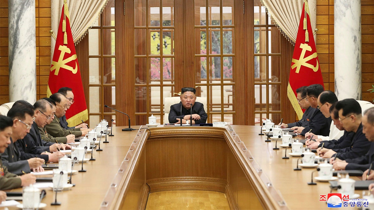 In this photo provided by the North Korean government, Kim Jong Un attends a meeting in Pyongyang, North Korea, Friday, June 4, 2021. 