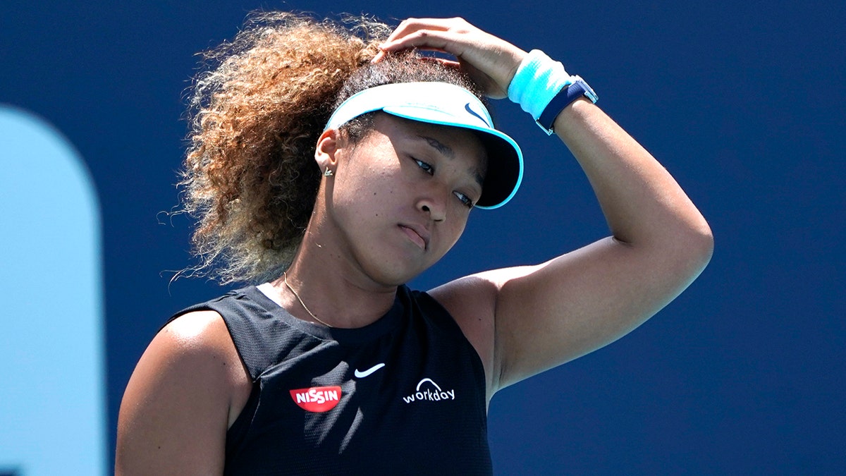 Naomi Osaka, of Japan, reacts during her match against Maria Sakkari, of Greece, in the quarterfinals of the Miami Open tennis tournament in Miami Gardens, Fla., in this Wednesday, March 31, 2021, file photo.