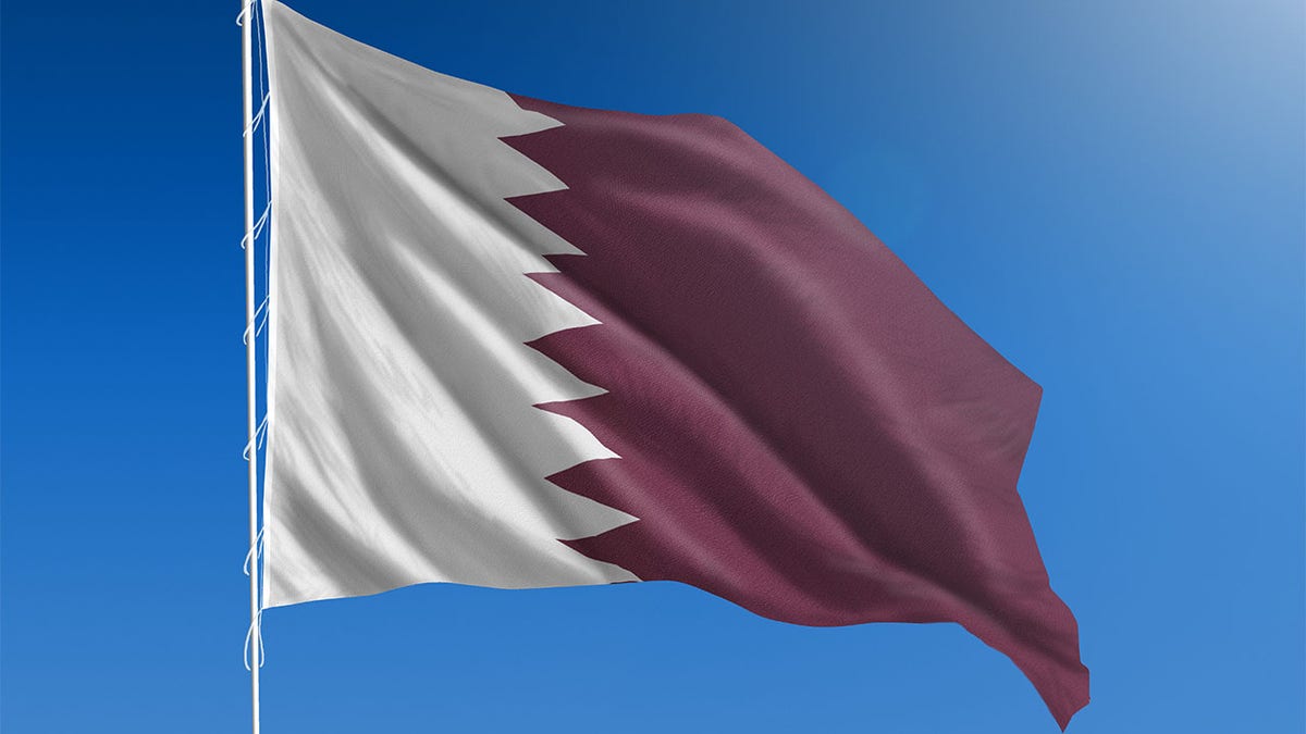 The National flag of Qatar.
