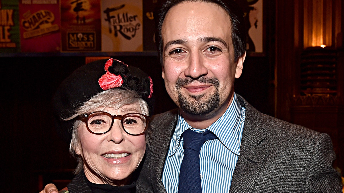 Lin-Manuel Miranda posing with EGOT winner Rita Moreno. 