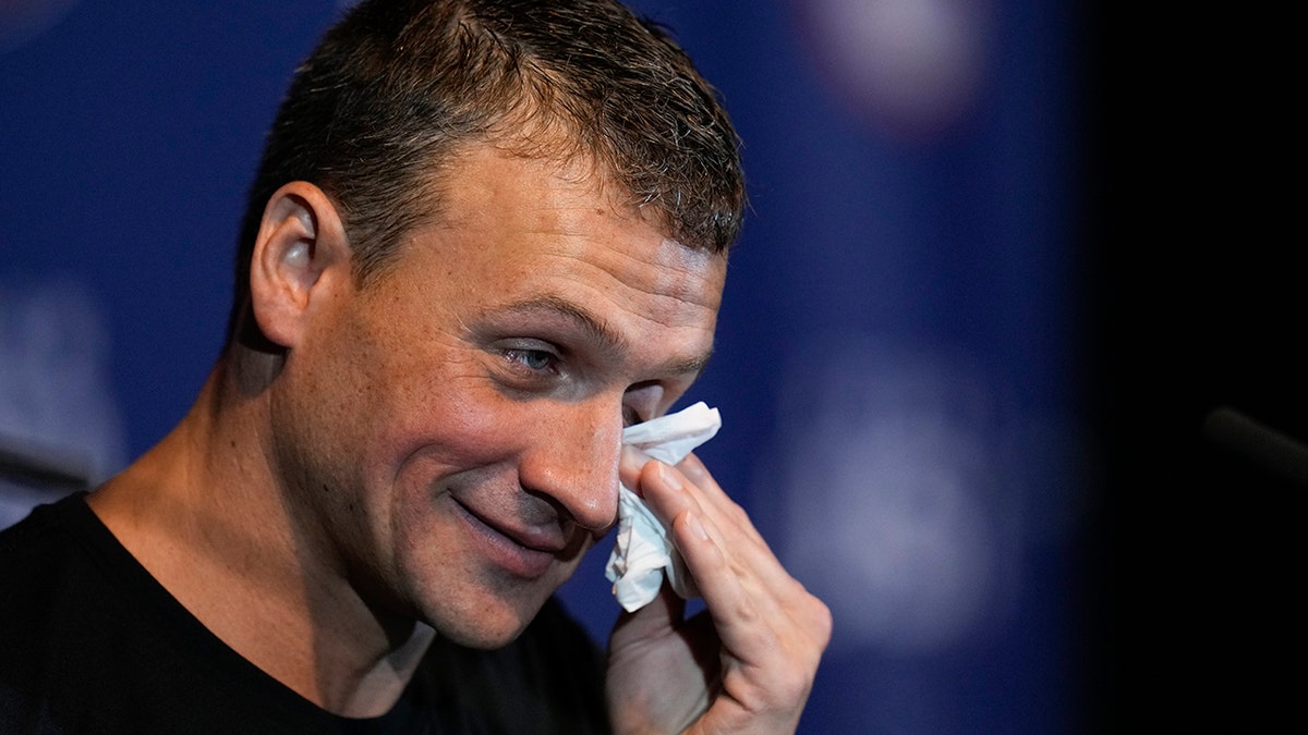 Ryan Lochte cries during an interview after the men's 200 individual medley during wave 2 of the U.S. Olympic Swim Trials on Friday, June 18, 2021, in Omaha, Nebraska.