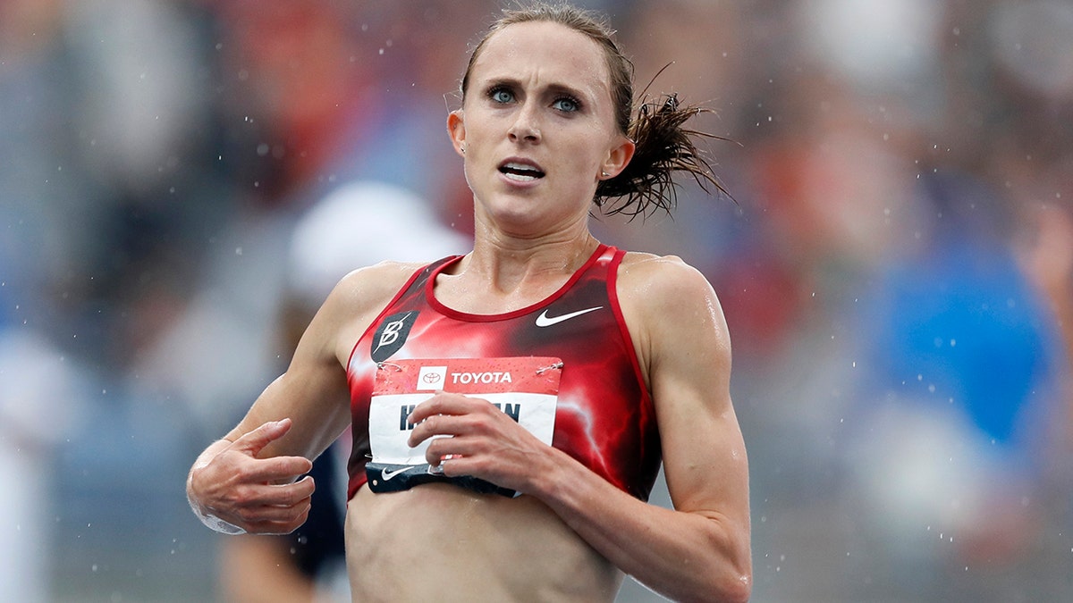 Houlihan, the American record holder in the 1,500 and 5,000 meters, posted on social media that she’s been banned for four years following a positive test for what she concluded was a tainted pork burrito. Houlihan said she received an email from the Athletics Integrity Unit (AIU) on Jan. 14, 2021, notifying her that a drug testing sample returned a finding for the anabolic steroid nandrolone. (AP Photo/Charlie Neibergall, File)