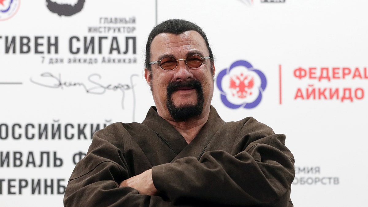 American actor Steven Seagal (front), chief instructor at the Russian Aikido Federation, poses during the International Aikido Festival held at the RMK Academy of Martial Arts. Donat Sorokin/TASS 