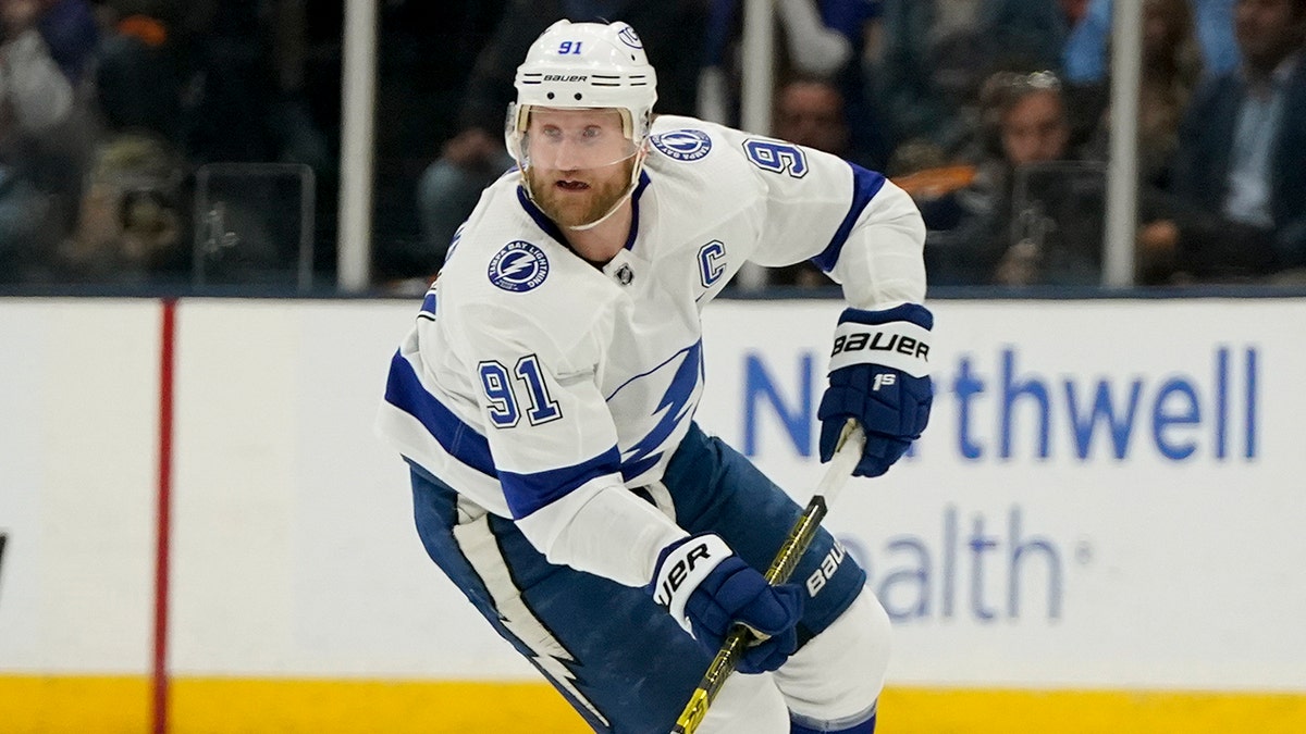 Tampa Bay Lightning center Steven Stamkos brings the puck up the ice against the New York Islanders during the first period of Game 6 of the NHL hockey Stanley Cup semifinals, Wednesday, June 23, 2021, in Uniondale, N.Y. (AP Photo/Frank Franklin II)