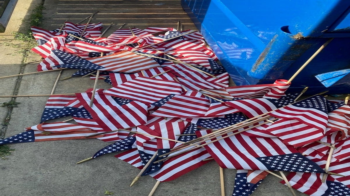 Some of the flags were left near a dumpster. (Courtesy VFW Post &amp; Auxiliary #1138)