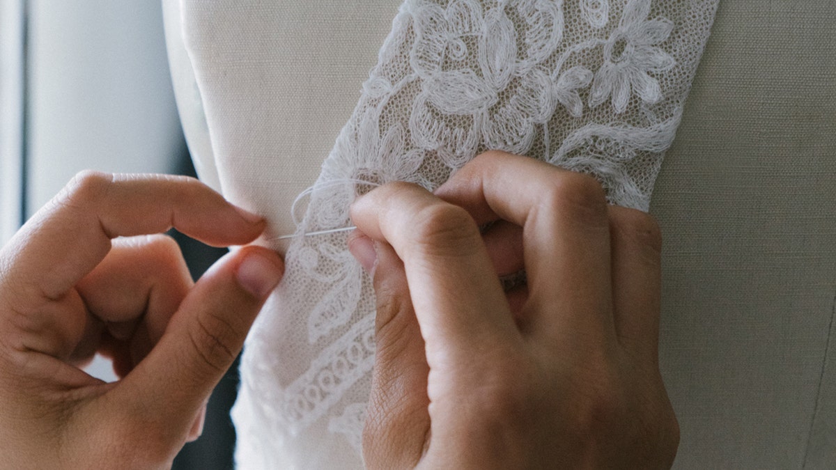 Bridal knitwear designer Esther Andrews hand-knit her own wedding dress and documented the experience on TikTok. (iStock)
