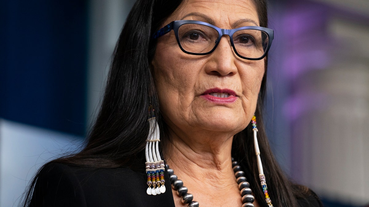 In this April 23, 2021, file photo, Interior Secretary Deb Haaland speaks during a news briefing at the White House in Washington. On Tuesday, June 22, 2021, Haaland and other federal officials are expected to announce steps that the federal government plans to take to reconcile the legacy of boarding school policies on Indigenous families and communities across the U.S.