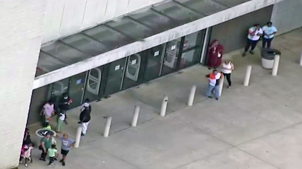 A gunbattle outside an Atlanta-area shopping mall left one person injured. Seven people have been detained.